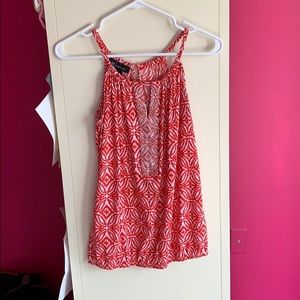 Red and white tank
